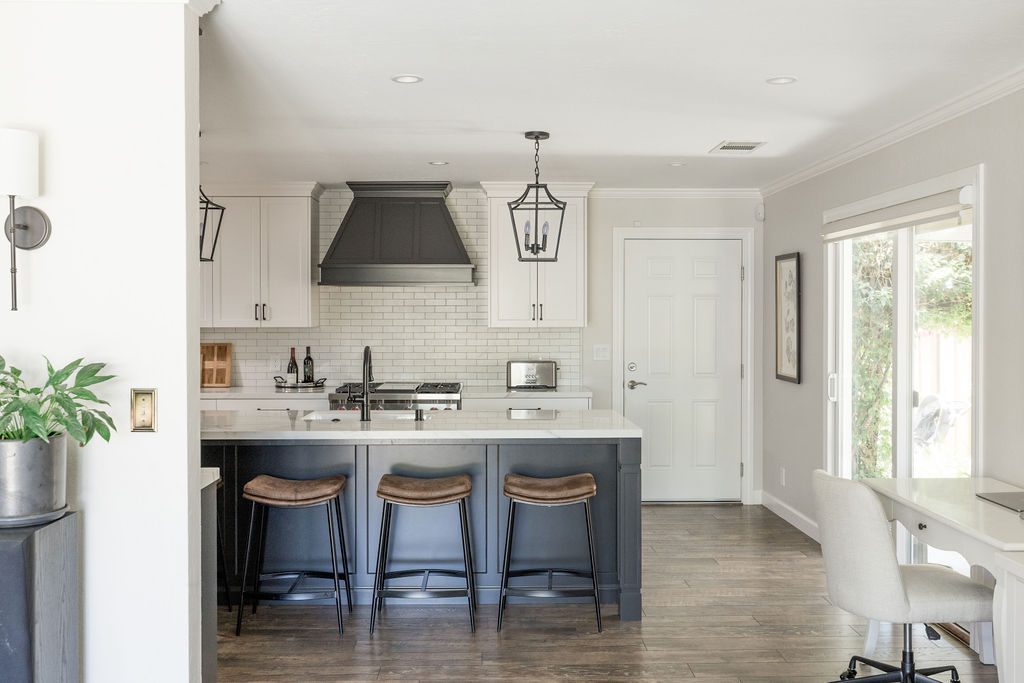 Contemporary kitchen remodel with open floor plan and wood cabinetry, illustrating steps from a remodel checklist.